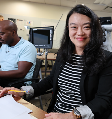 Senior Education Specialist Sharon Wen at a training.