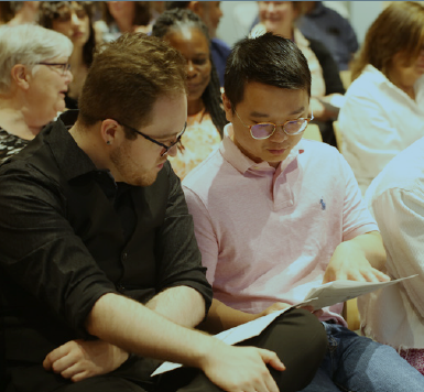 Information Systems Assistant Connor Hing and Senior Programmer/Analyst Yehui Liu at the PDP Staff Recognition Event.